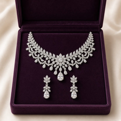 Silver zircon statement necklace and earrings in a plum case