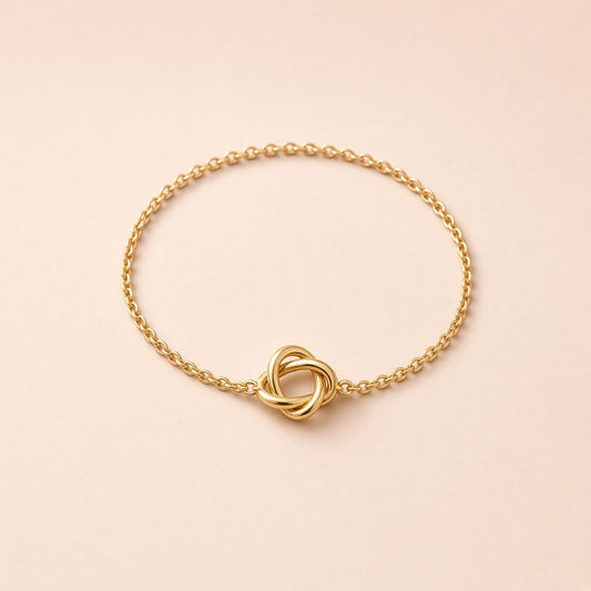 Dainty gold plated chain bracelet with a love knot