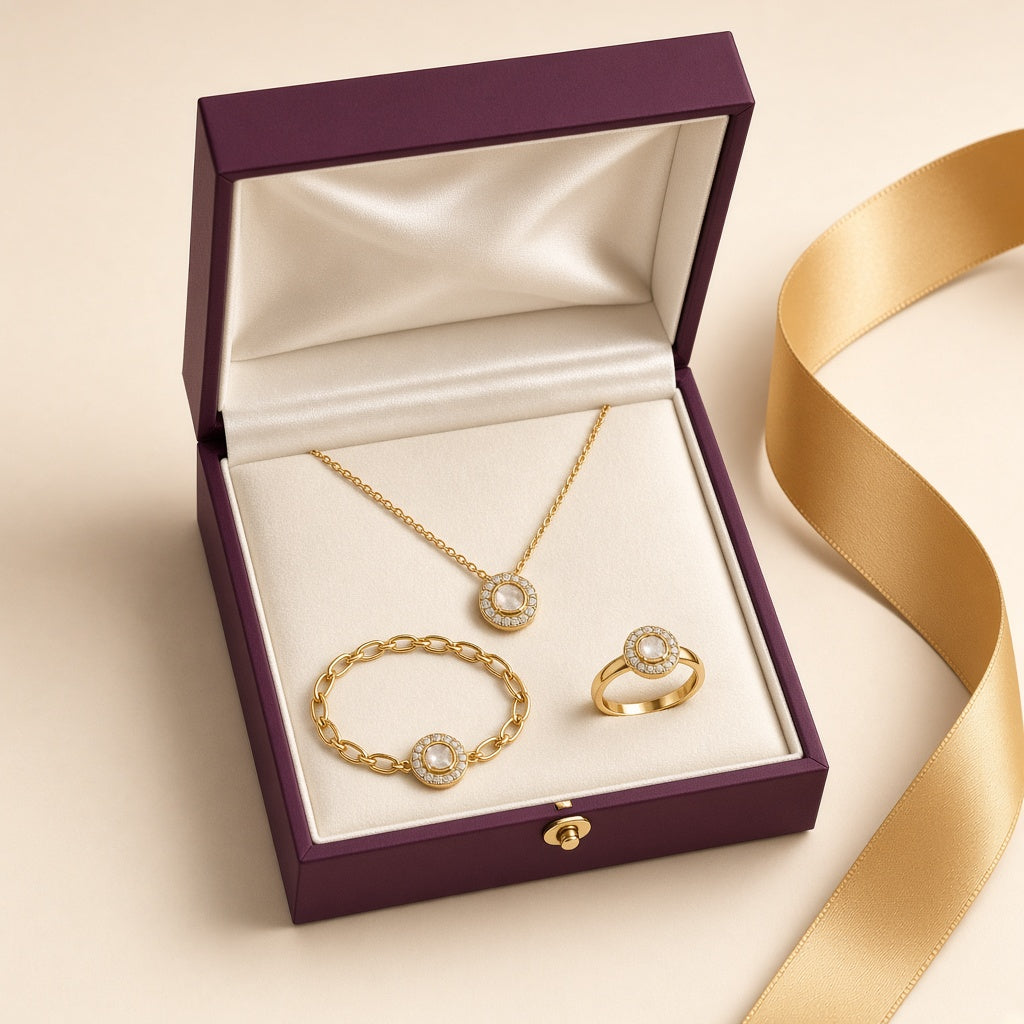 Plum gift box holding a pendant, bracelet and ring